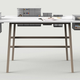 Illustration for article titled A Co-Working Table With Hidden Depths